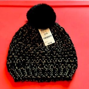 Never worn with tags INC winter toboggan